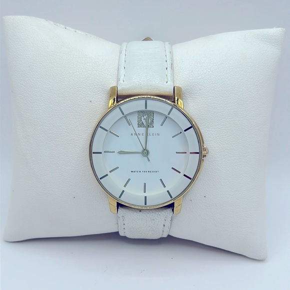 Anne Klein Accessories - Working! Anne Klein Lion Logo White Minimalist Watch